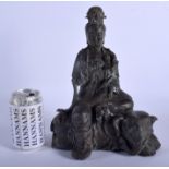 A LARGE CHINESE BRONZE FIGURE OF AN IMMORTAL 20th Century, modelled upon elephant. 30 cm x 17 cm.