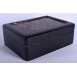 A 19TH CENTURY JAPANESE MEIJI PERIOD BLACK LACQUER BOX AND COVER decorated with birds. 21 cm x 28 cm