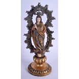 AN 18TH CENTURY EUROPEAN POLCYRHOMED RELIGIOUS WOOD FIGURE with white metal backing, upon a gilded b