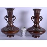 A LARGE PAIR OF 19TH CENTURY JAPANESE MEIJI PERIOD SILVER AND GOLD ONLAID BRONZE VASES decorated wit