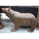 A VERY LARGE 19TH CENTURY BAVARIAN BLACK FOREST CARVED WOOD BEAR modelled roaming with teeth exposed