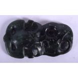 A FINE AND RARE MAORI PENDANT IN HUMAN FORM New Zealand, Hei Tiki, Greenstone/Nephrite Jade (possibl