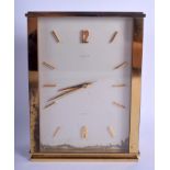 A VINTAGE TIFFANY & CO BRASS MANTEL CLOCK. 18 cm x 13 cm.
