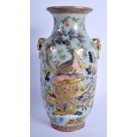 A 19TH CENTURY CHINESE CANTON ENAMEL FAMILLE ROSE VASE Qing, painted with figures. 23.5 cm high.