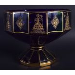 AN ANTIQUE BOHEMIAN BLUE AND GILT PEDESTAL GLASS BOWL decorated with figures. 18 cm x 17 cm.