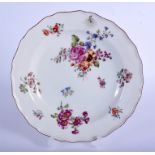 Chelsea plate painted with flowers in Meissen style, red anchor mark. 20 cm wide.