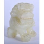 AN EARLY 20TH CENTURY CHINESE CARVED JADE BUDDHISTIC LION Late Qing/Republic. 5 cm x 4 cm.
