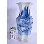 AN EARLY 19TH CENTURY CHINESE BLUE AND WHITE LOZENGE SHAPED VASE Kangxi style, bearing poetic inscri