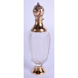 AN ANTIQUE GOLD MOUNTED FRENCH SCENT BOTTLE. 10 cm high.