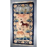 AN ART DECO CHINESE RUG decorated with horses. 131 cm x 69 cm.