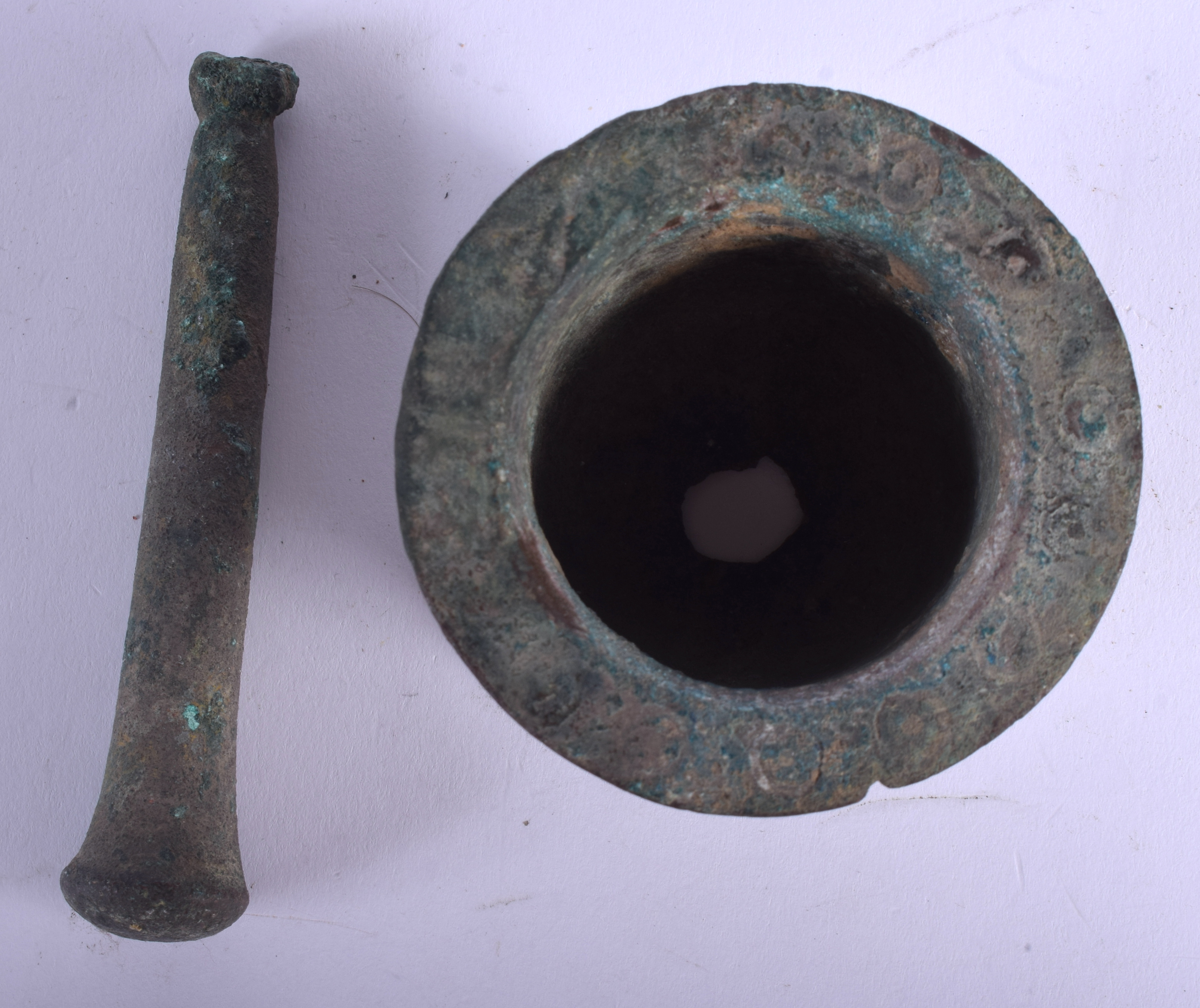 A 14TH/15TH CENTURY ISLAMIC BRONZE PESTLE AND MORTAR. 8 cm wide. (2) - Image 3 of 3
