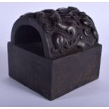 A LARGE CHINESE BRONZE SEAL 20th Century, overlaid with chilong dragons. 10 cm x 11 cm.