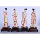 A SET OF FOUR EARLY 20TH CENTURY CHINESE PAINTED IVORY FIGURES modelled in various poses.