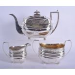 AN EARLY 19TH CENTURY ENGLISH SILVER TEASET. London 1810. 38.1 oz. Largest 27 cm x 17 cm. (3)