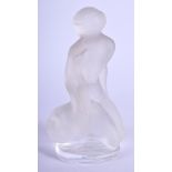 A LALIQUE GLASS FIGURE OF A NUDE FEMALE beside a swan. 12 cm high.