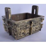 A LARGE 19TH CENTURY CHINESE TWIN HANDLED BRONZE CENSER Qing, of archaic form, decorated with mask h