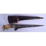 A 19TH CENTURY MIDDLE EASTERN CARVED IVORY HANDLED DAGGER with white metal inlaid handle. 38.5 cm lo