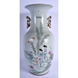A CHINESE REPUBLICAN PERIOD FAMILLE ROSE VASE painted with figures beside flowering rock. 43 cm x 15