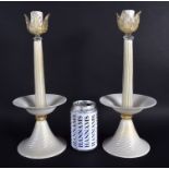 A PAIR OF ITALIAN SALVIATI GLASS CANDLESTICKS upon spiral bases. 34 cm high.