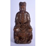 A 17TH/18TH CENTURY CHINESE CARVED WOOD FIGURE OF AN IMMORTAL Ming/Qing, modelled holding a prayer b