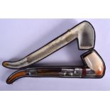 A RARE 19TH CENTURY FRENCH SILVER AMBER MEERSCHAUM PIPE of very unusual form. 22 cm long.