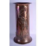 A LARGE ARTS AND CRAFTS ENGLISH COPPER STICK STAND Newlyn School, decorated with a standing stork an
