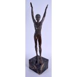 A LARGE 1950S BRONZE FIGURE OF A BALLERINA modelled upon a marble base. Bronze 37 cm high.