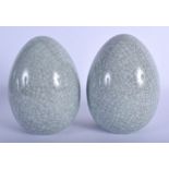 A PAIR OF CHINESE GE TYPE POTTERY EGGS 20th Century. 16 cm high.