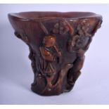 A CHINESE CARVED BUFFALO HORN STYLE LIBATION CUP 20th Century. 12.5 cm x 12.5 cm.