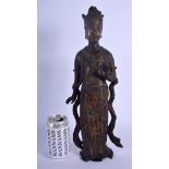 A LARGE CHINESE QING DYNASTY LACQUERED BRONZE FIGURE OF A BUDDHSITIC DEITY modelled in flowing robes