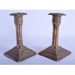 A PAIR OF ANTIQUE SILVER CANDLESTICKS. 32 oz loaded. 16 cm high.