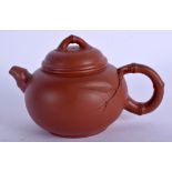 AN EARLY 20TH CENTURY CHINESE YIXING POTTERY TEAPOT AND COVER by Ma Hui Rong, moulded with bamboo sh