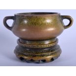 A CHINESE TWIN HANDLED BRONZE CENSER ON STAND 20th Century. 10.5 cm wide, internal width 5.5 cm.
