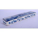 A CHINESE BLUE AND WHITE PORCELAIN SCROLL WEIGHT 20th Century, painted with scholars and landscapes.