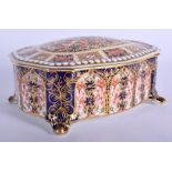 Royal Crown Derby pattern 1128 footed casket and cover. 14 cm wide.