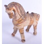AN EARLY CONTINENTAL POTTERY MODEL OF A HORSE possibly Indus Valley. 16 cm x 18 cm.