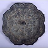 A LARGE CHINESE BRONZE HAND MIRROR 20th Century, decorated with flowers. 20 cm wide.