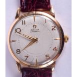 A VINTAGE 18CT GOLD OMEGA AUTOMATIC BUMPER WRISTWATCH. 3.25 cm wide.