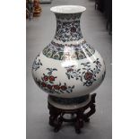 AN EARLY 20TH CENTURY CHINESE DOUCAI PORCELAIN HU VASE Late Qing/Republic, bearing Yongzheng marks t