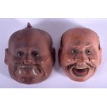A PAIR OF 19TH CENTURY JAPANESE MEIJI PERIOD CARVED AND LACQUERED NOH MASKS. 5 cm x 6 5 cm.