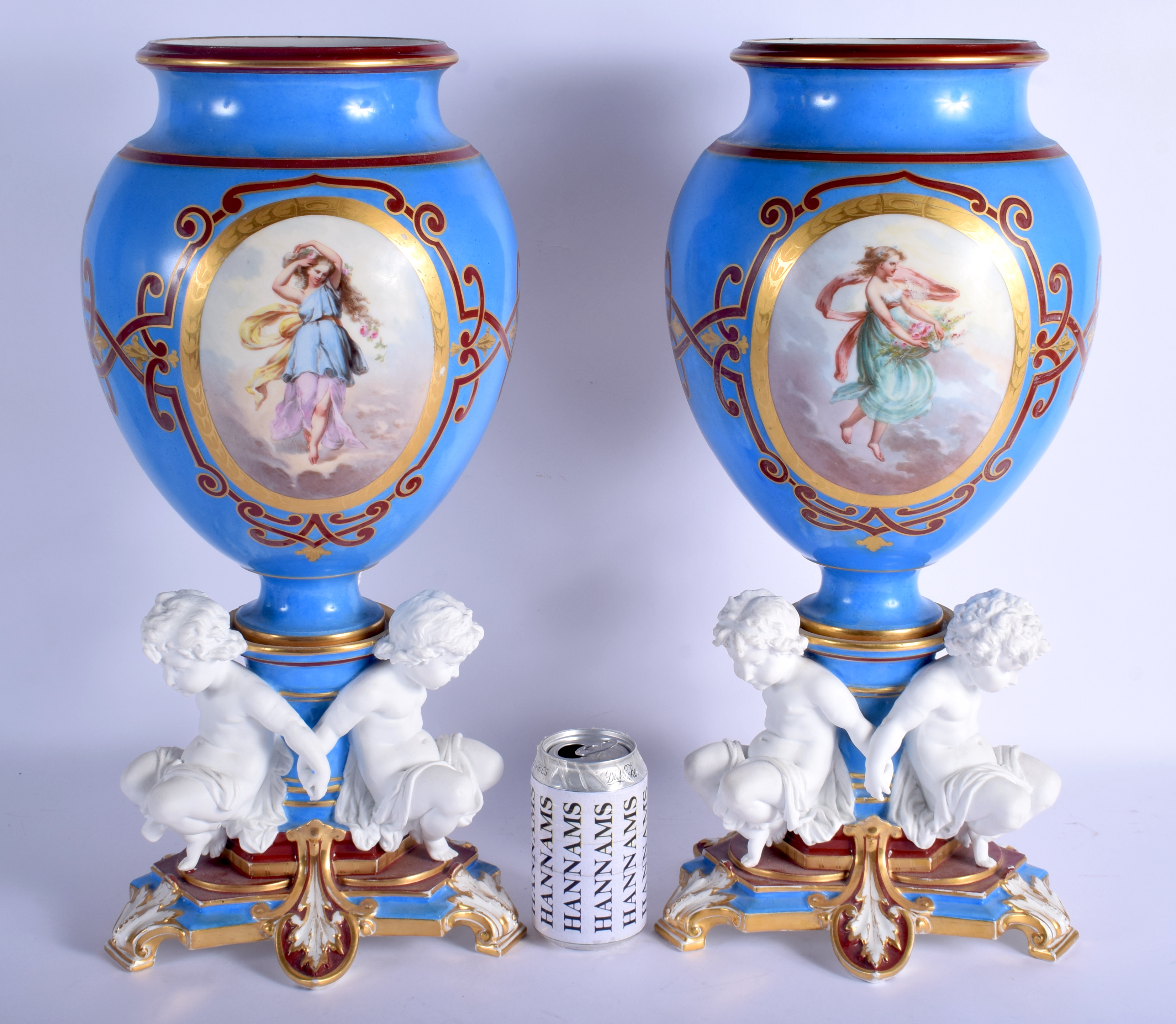 A SUPERB LARGE PAIR OF 19TH CENTURY PARIS PORCELAIN VASES painted with classical scenes, supported b