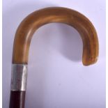 A 19TH CENTURY CONTINENTAL CARVED RHINOCEROS HORN HANDLED WALKING CANE. 88 cm long.