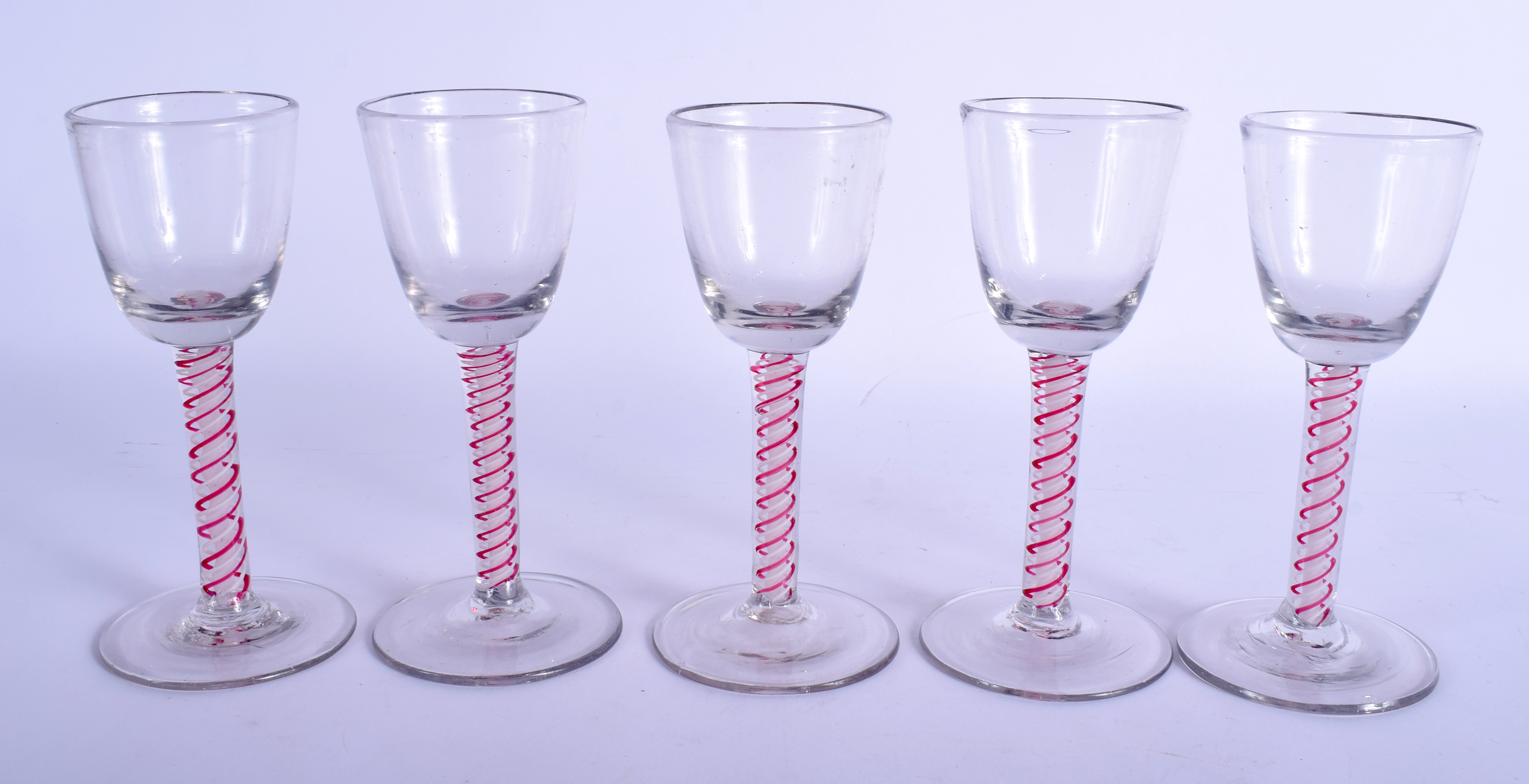 A SET OF FIVE 18TH CENTURY ENGLISH GLASSES C1770 with pink and white spiral twist stems. 16 cm high. - Image 2 of 16