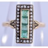 AN 18CT GOLD EMERALD AND PEARL RING. 2.4 grams. K/L.