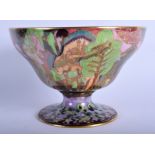 A FINE WEDGWOOD PORCELAIN FAIRYLAND LUSTRE PEDESTAL BOWL by Daisy Makeig Jones. 18 cm x 13 cm.