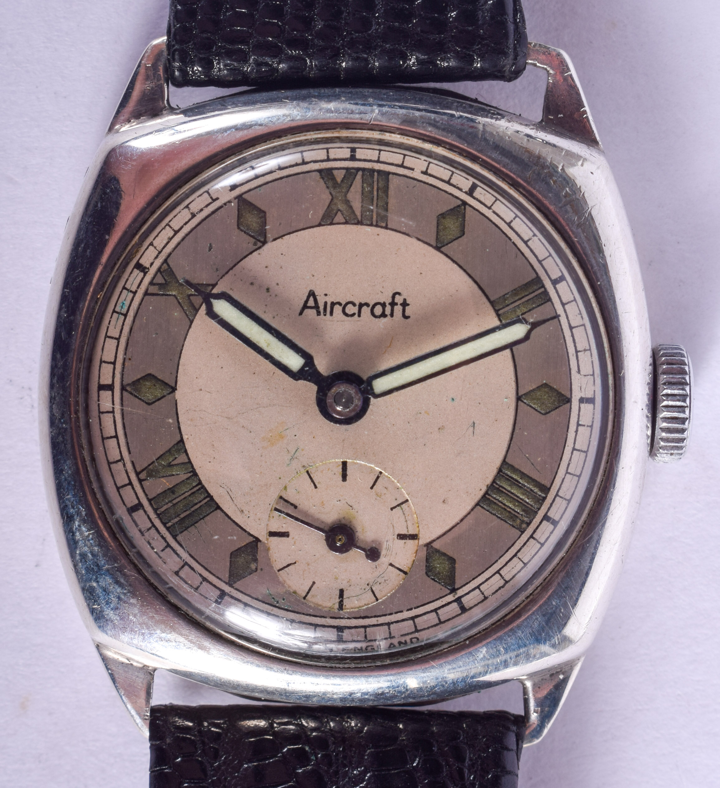 A 1943 AIRCRAFT SILVER WRISTWATCH. 2.75 cm wide.