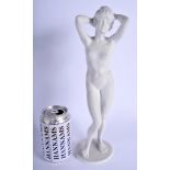 A VINTAGE KAISER WEST GERMAN BISQUE PORCELAIN FIGURE OF A NUDE FEMALE. 33 cm high.