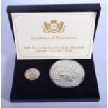 A BOXED ST GEORGE AND DRAGON PAIR OF SILVER PROOF COINS.
