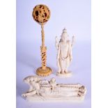 TWO 19TH CENTURY ANGLO INDIAN CARVED IVORY FIGURES together with a puzzle ball. Largest 10 cm wide.
