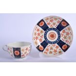 Worcester teacup and saucer painted with Old Japan Star pattern, fretted square. 13 cm wide.